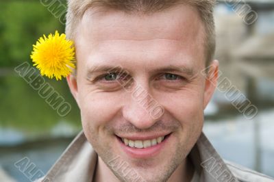 man with dandelion
