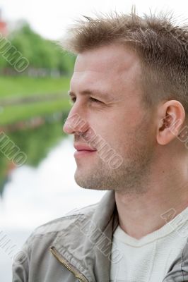 smiling man half face