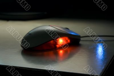 lighted mouse on a table