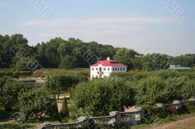 white  house with red roof