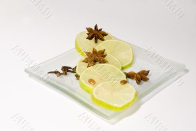 Lime slices over glass plate