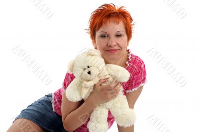 red haired woman with teddy bear isolaited on white background