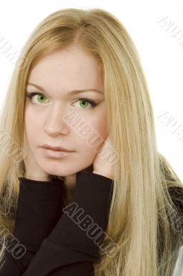young attractive green-eyed dreaming woman