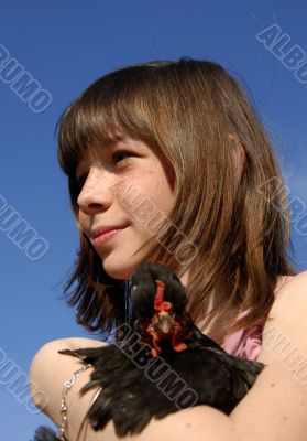 young girl and chicken