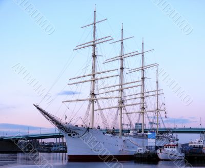 sail ship in the harbour in beautiful sunset