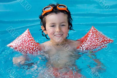 Child in the pool on holiday