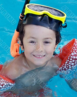 Child in the pool on holiday