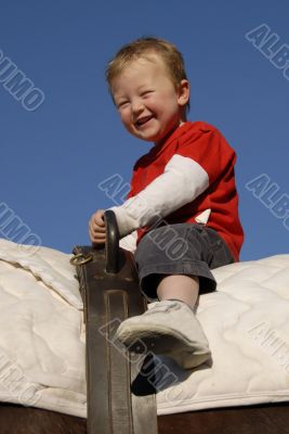 riding little boy