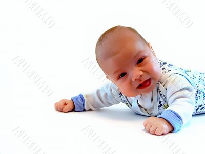 Beautiful kid lays on a stomach