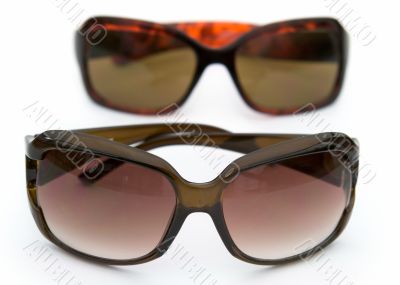 Sun glasses on a white