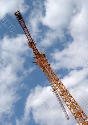 Tower crane in the clouds