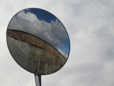 barn in a rear view mirror