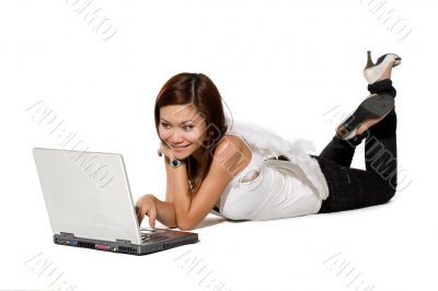 woman enjoying using laptop