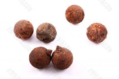 Six rusted balls