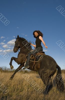 rearing stallion and girl