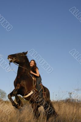 rearing stallion and girl