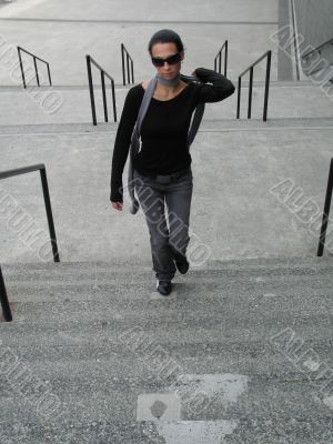 female walking up stairs