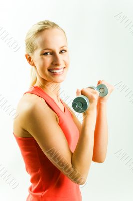 Woman with dumbbells