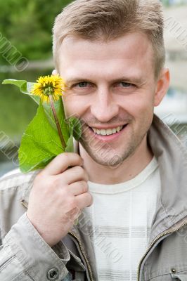man with dandelion