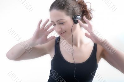 Woman with long curly hair enjoying the music