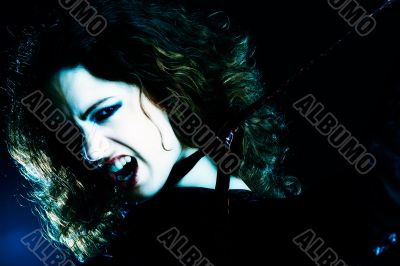 Woman with long curly hair in extasy