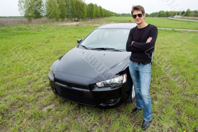 man against car