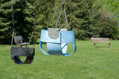 Two Empty Baby Swings