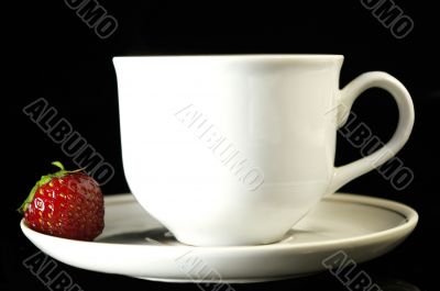 Cup of coffee and strawberry