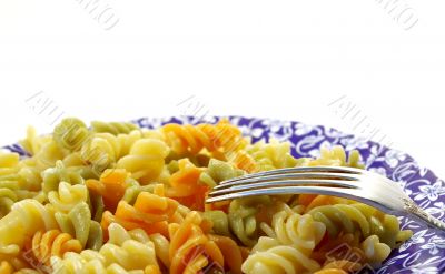 plate of tricolor macaronis and plug