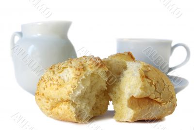 bun, cup of coffee and milk
