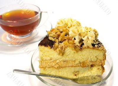 Cup of tea and cake isolated