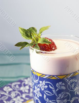 Glass of yoghurt and strawberry