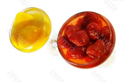 Strawberry and a mango in a syrup