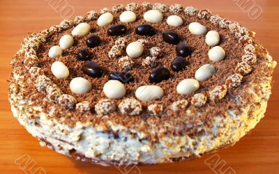 celebratory ornate chocolate cake on a table