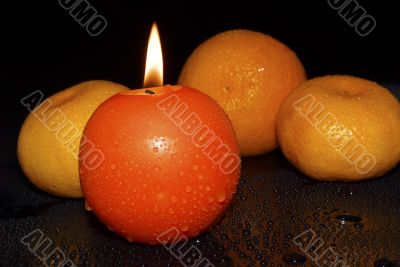  mandarins, orange and candle