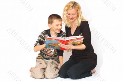 Mother with son reading