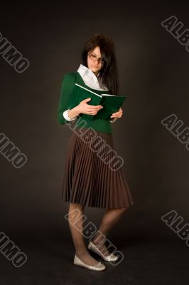 Businesswoman reading book
