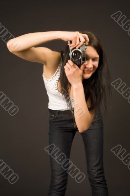 Young girl with camera