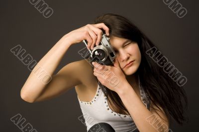 Fashion girl with camera