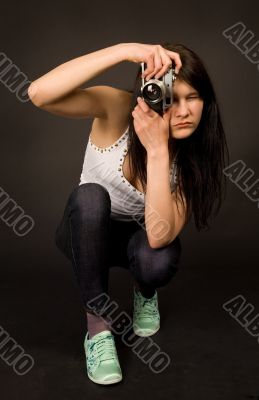 Young girl with old camera