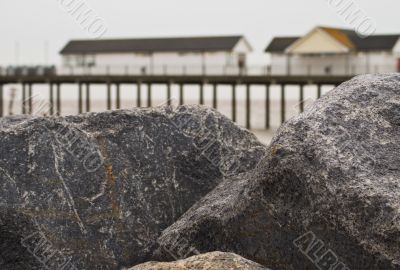Rocks in front of the pier