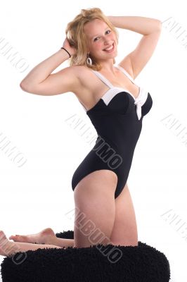 Sexy voluptuous blonde in pin-up pose