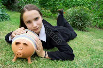 Girl with Piggy