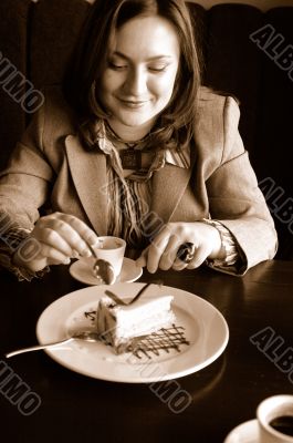 Woman eating a cake