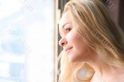 beautiful girl at the window