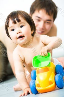 Baby with toy