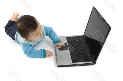 sweet baby with laptop