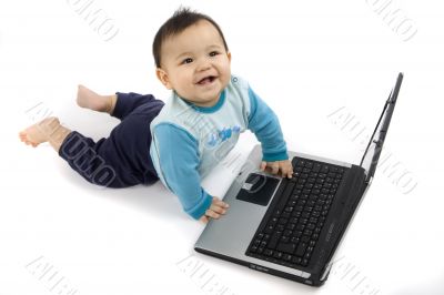 sweet baby with laptop