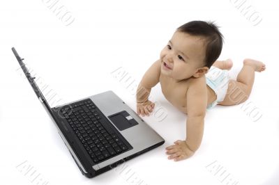 sweet baby with laptop