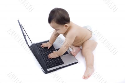 sweet baby with laptop